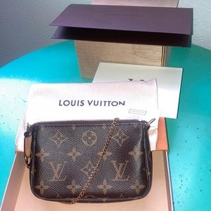 Authentic Louis Vuitton Mini Pochette Accessories. Monogram. Made in France.
